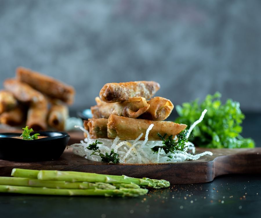 a plate of spring onions - polo floatel kolkata