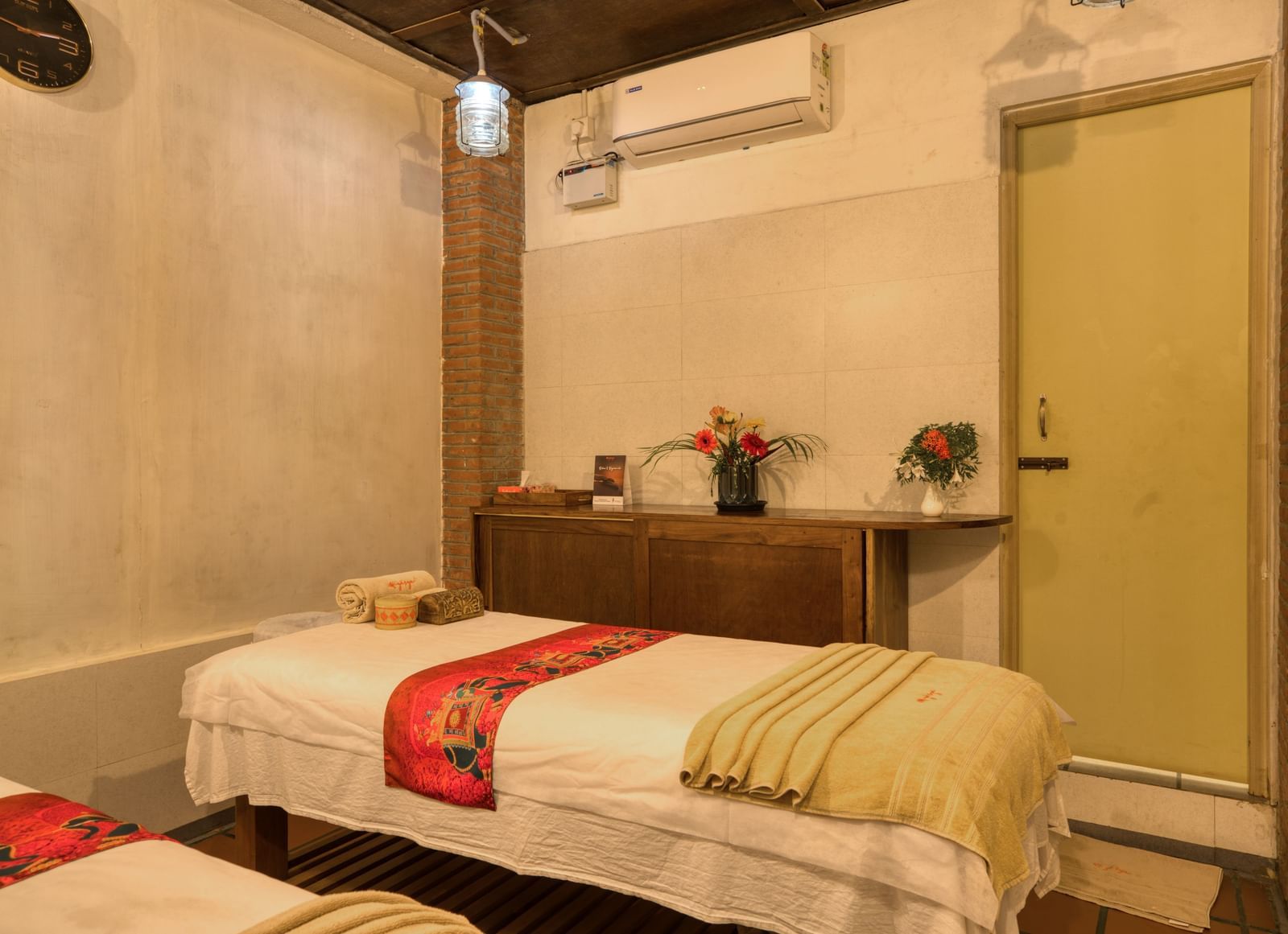 SPA room with a  SPA bed and a side table.