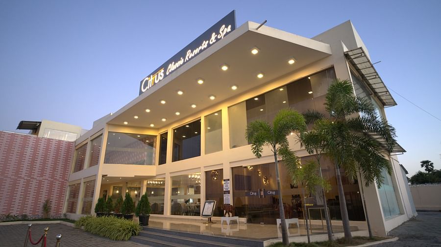 Exterior of Citrus Classic Resorts and Spa Mahabalipuram ECR with the building lit up in ambient lights