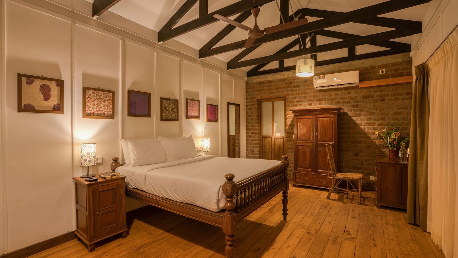Swiss Chalet Bedroom  with a bed, side table and closet.
