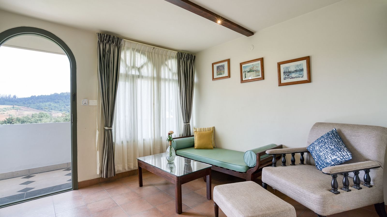 Overview of the living area inside bedroom villa with a balcony | Mango Hill Shola Ooty