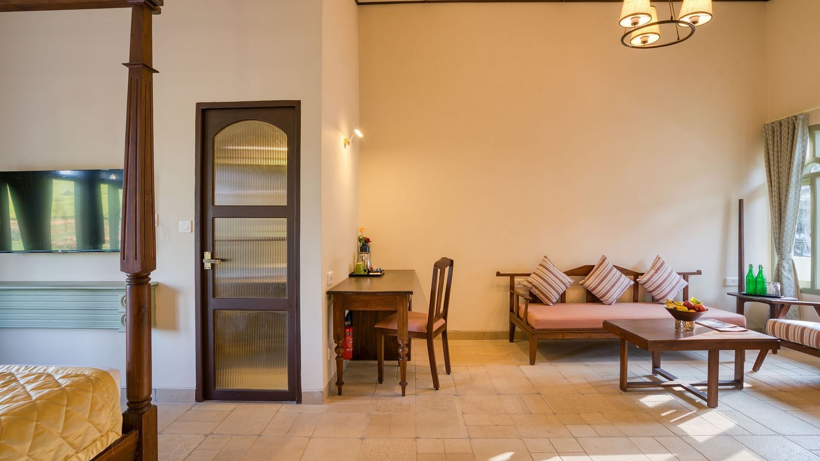 Overview of the living room as seen from the bedroom of Deluxe room | Mango Hill Shola Ooty