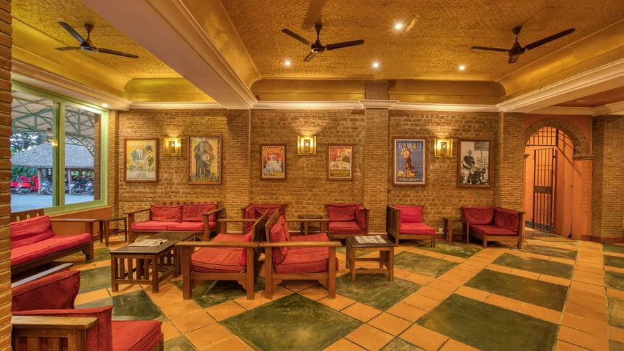 Lobby with seating area and tables