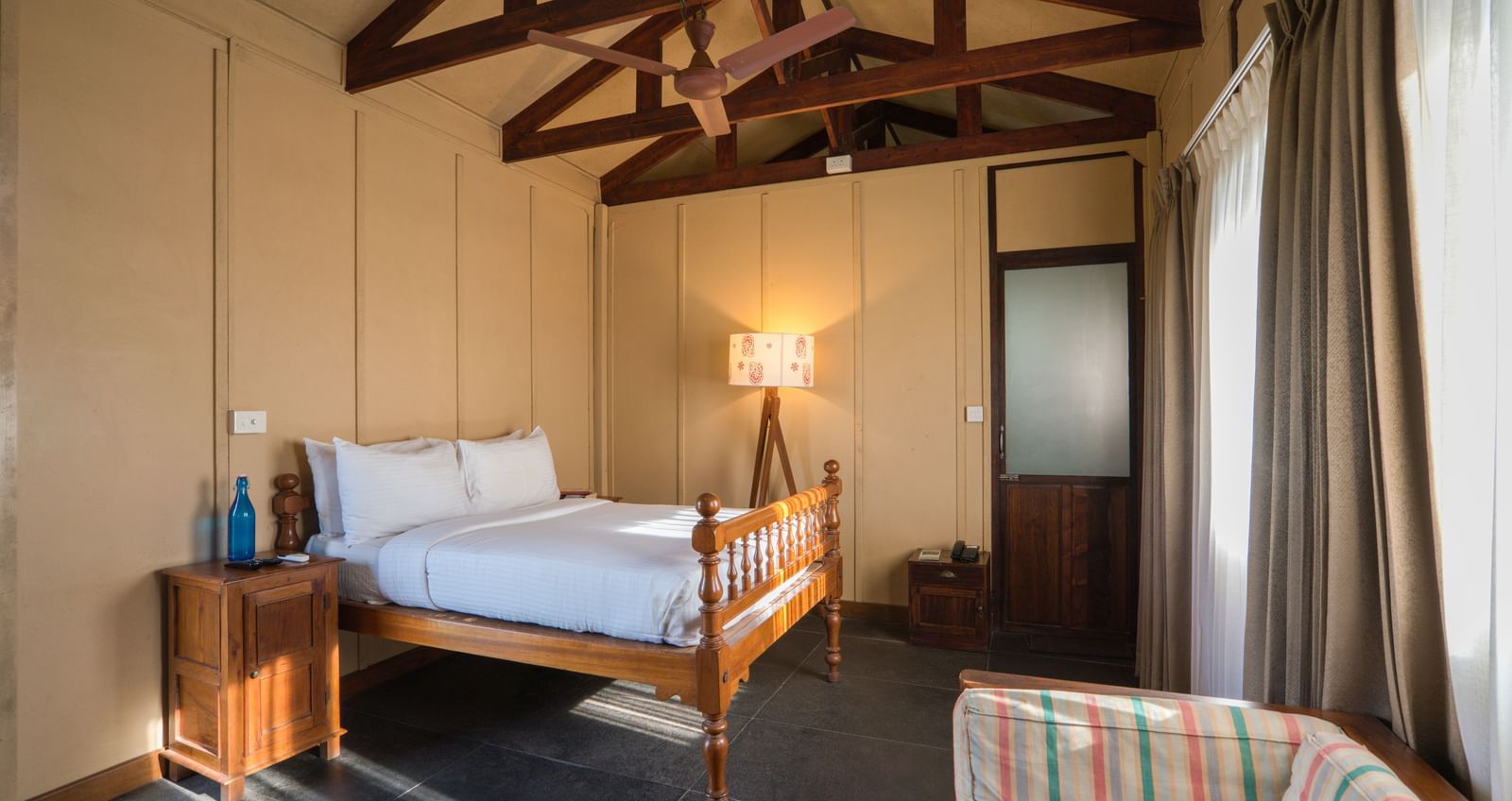 Superior Bedroom with a Bed and side table.