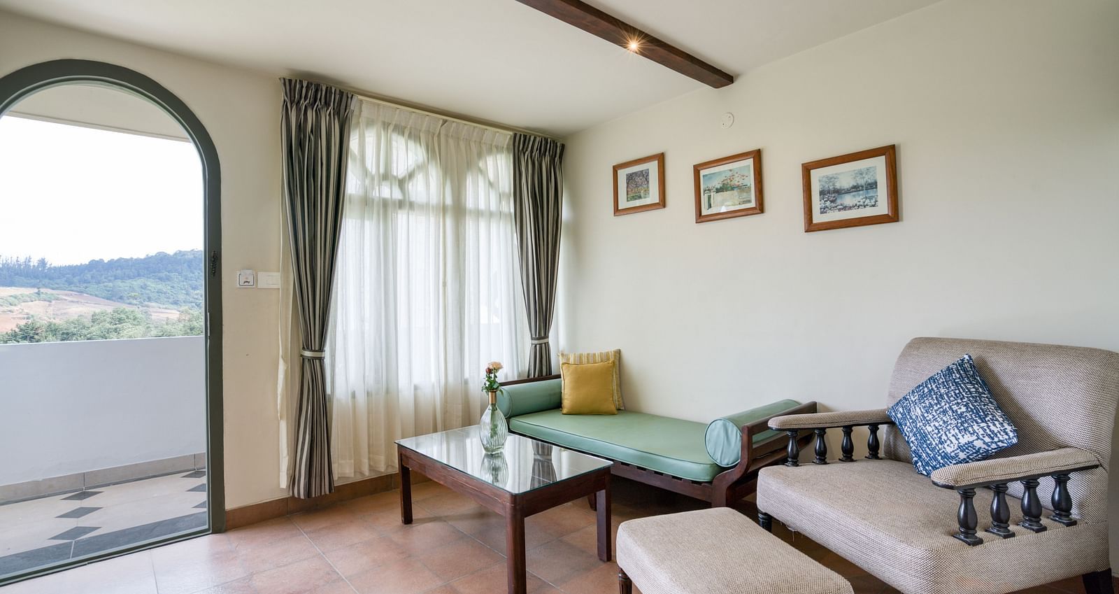 Overview of the living area inside bedroom villa with a balcony | Mango Hill Shola Ooty
