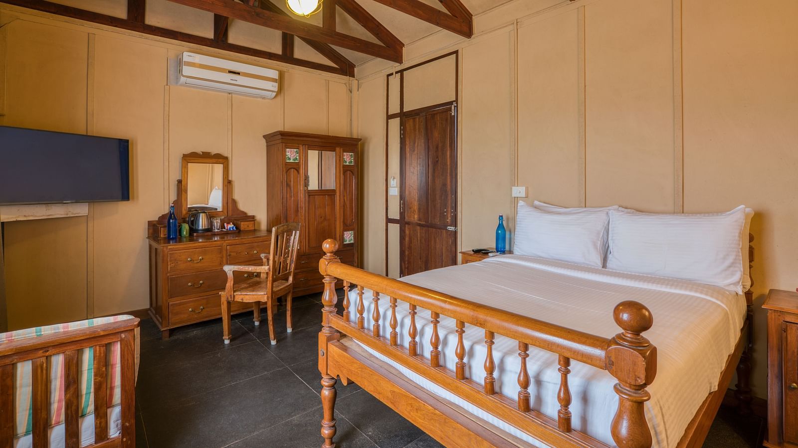Superior Bedroom with a bed and dressing table.