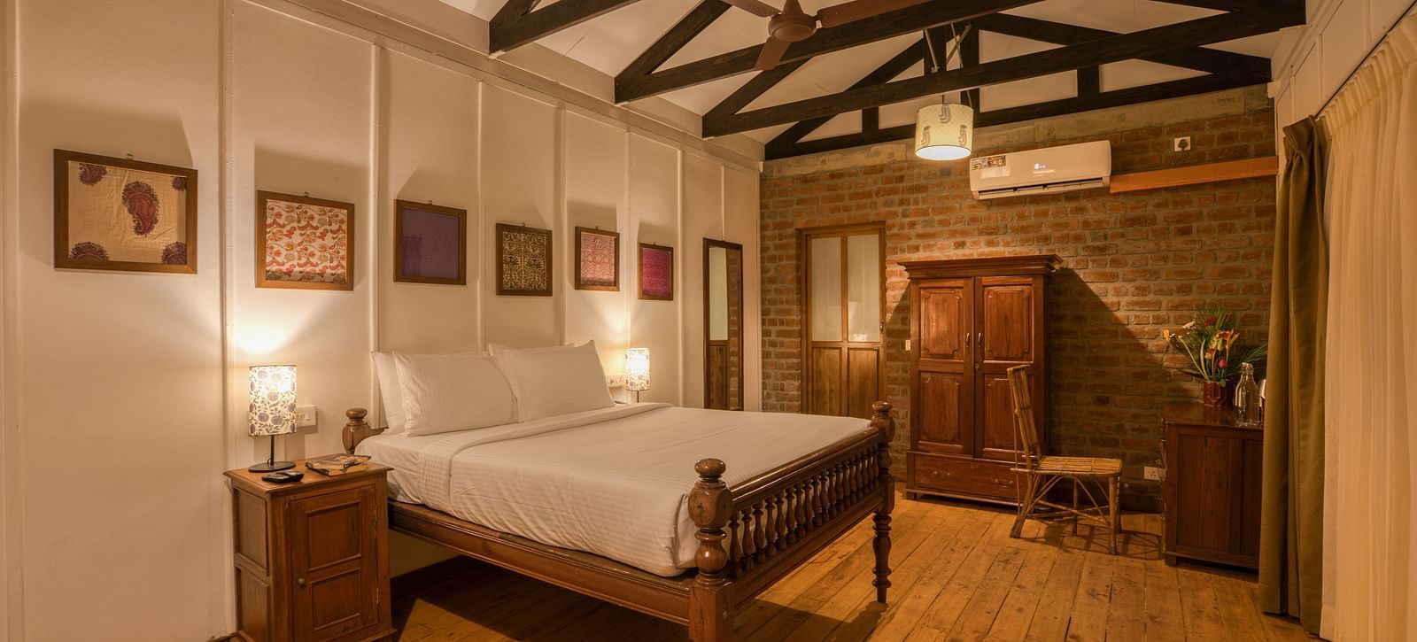 Swiss Chalet Bedroom  with a bed, side table and closet.