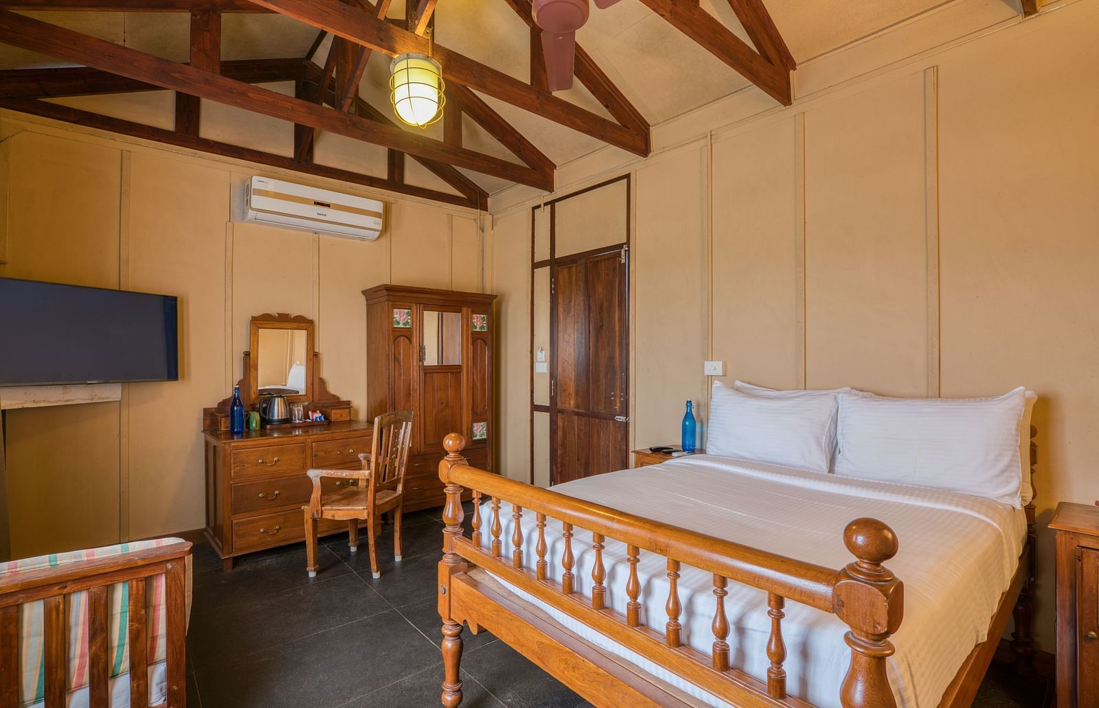 Superior Bedroom with a bed and dressing table.