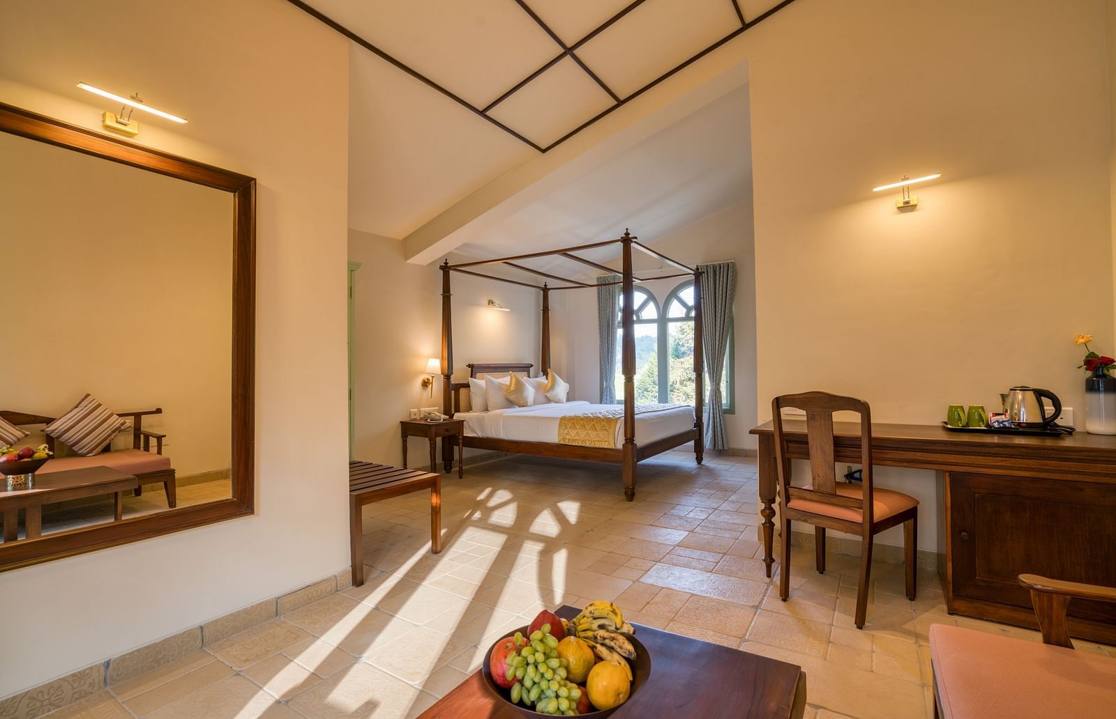 A double bed as seen from the living room of deluxe room | Mango Hill Shola Ooty