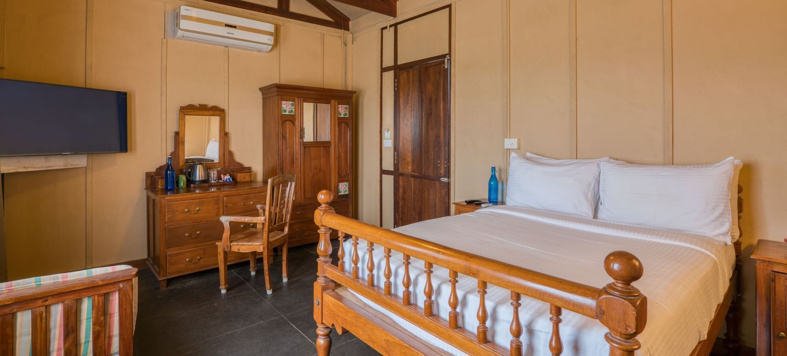 Superior Bedroom with a bed and dressing table.