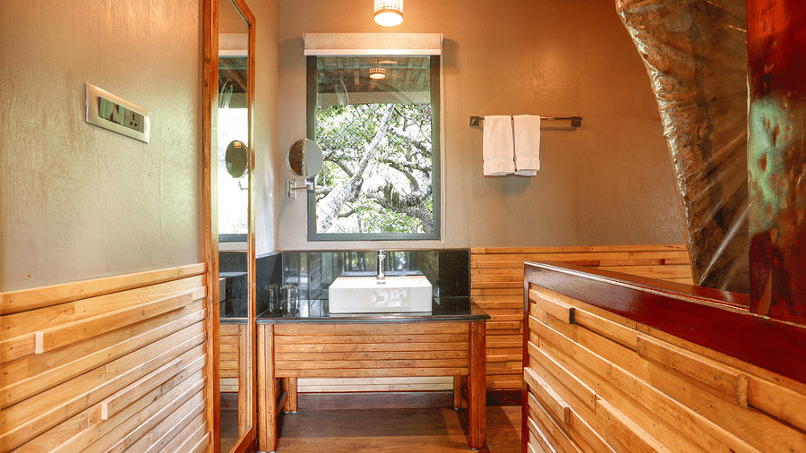 A wash basin in a room | Vythiri Resort. Wayanad