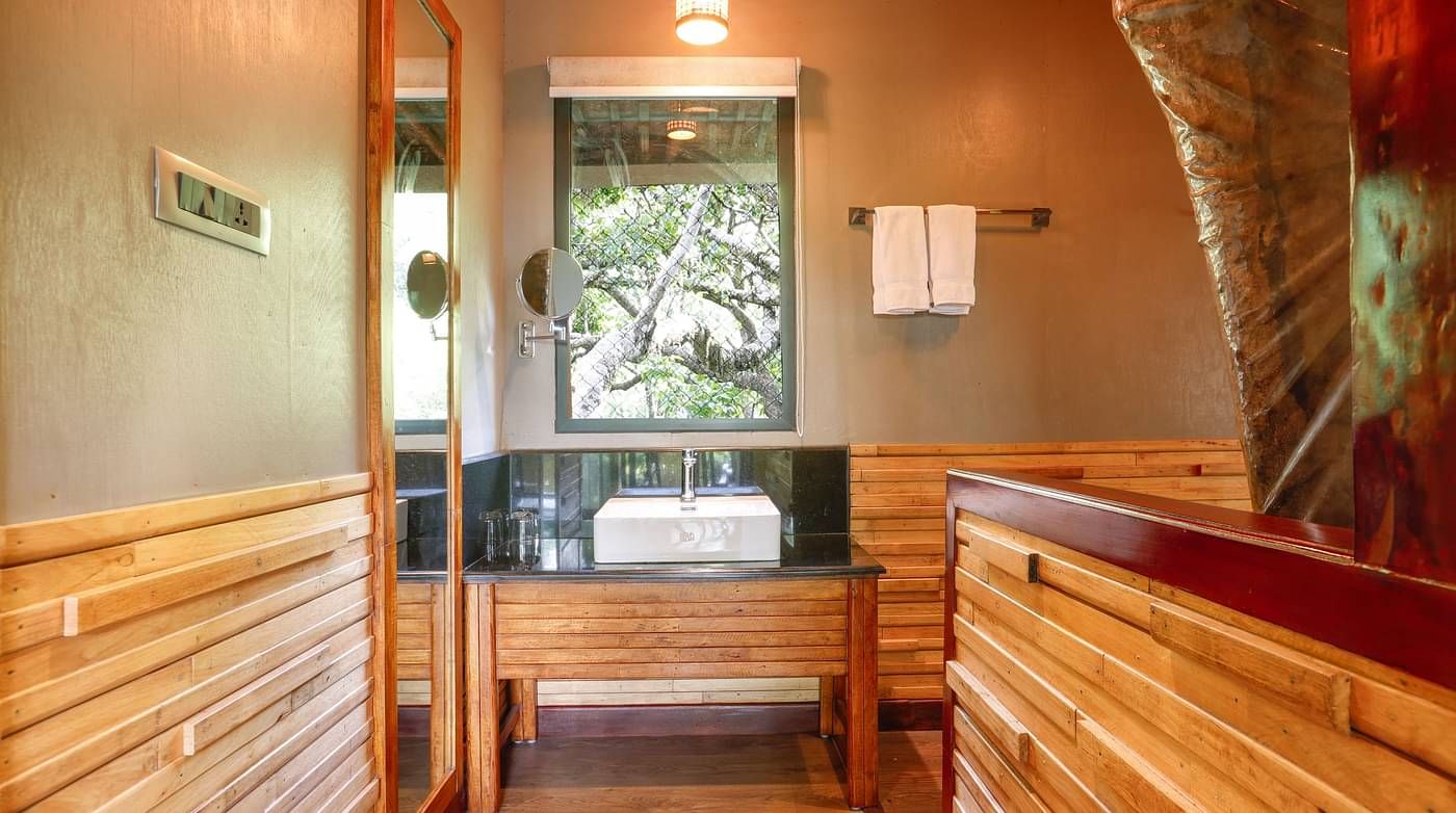 A wash basin in a room | Vythiri Resort. Wayanad