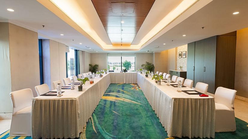 U-shaped seating arrangement inside the one of the event spaces - Karma Lakelands.