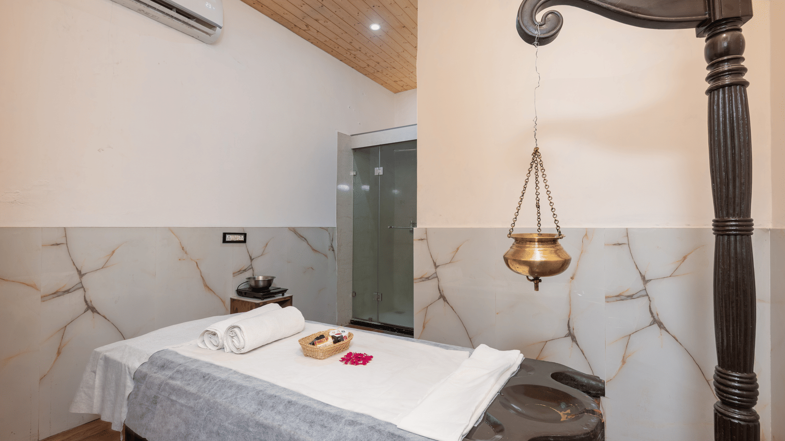 Spa massage bed with therapy setup at DLS Hotels On The Ganges.