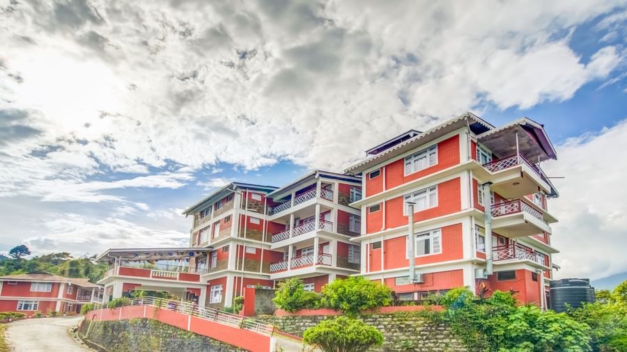 Facade of Summit Tashi Ghang Heritage Resort, Pelling surrouned by greenery