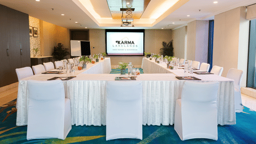 Rectangle seating arrangement with a tv in front during a Conference Corporate Event - Karma Lakelands.