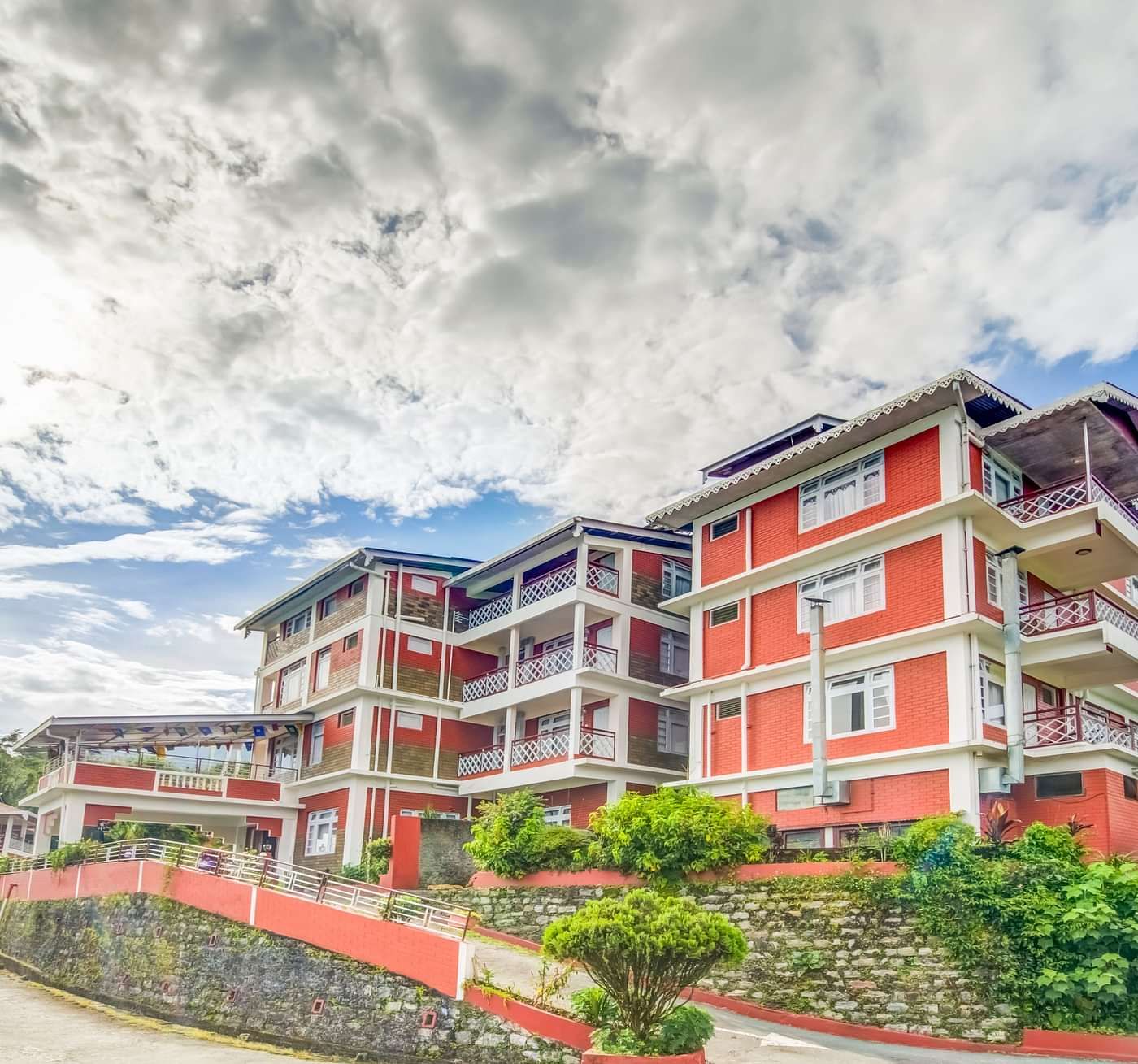 Facade of Summit Tashi Ghang Heritage Resort, Pelling surrouned by greenery