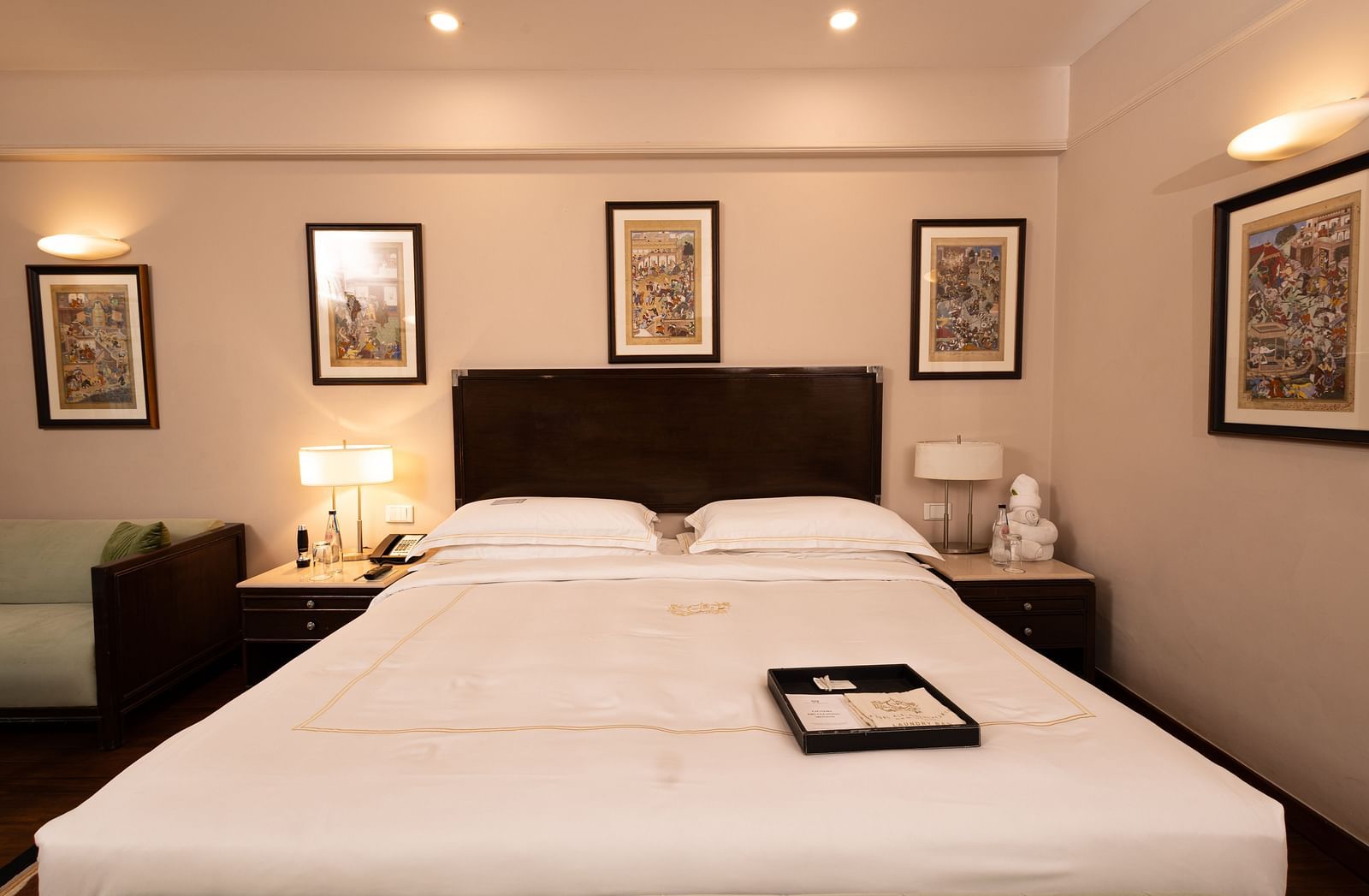 image of the king size bed with white sheets at the heritage balcony room - image of the heritage balcony room with sleek interiors and a a plush king size bed - The Claridges New Delhi