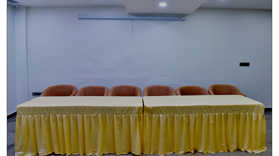 boardroom setting meeting area inside a banquet hall with yellow theme - Royal Lotus View Resotel