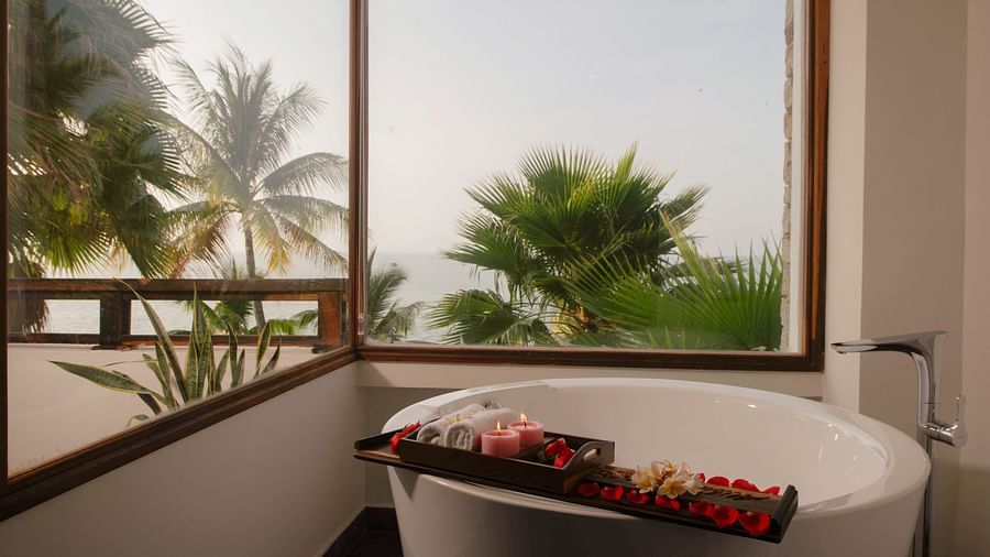 A bathtub in our suite overlooking scenic views - Alibu Resort Nha Trang