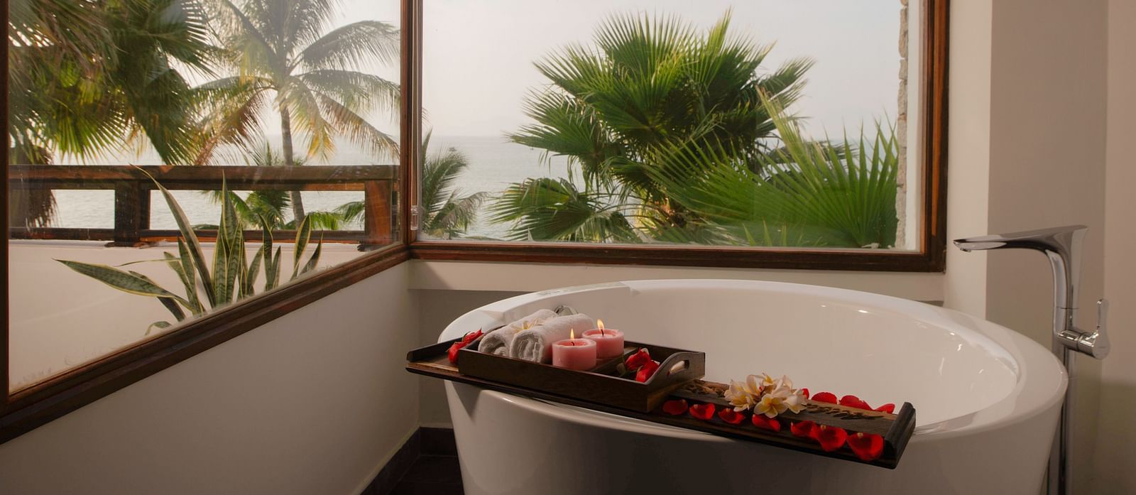 A bathtub in our suite overlooking scenic views - Alibu Resort Nha Trang