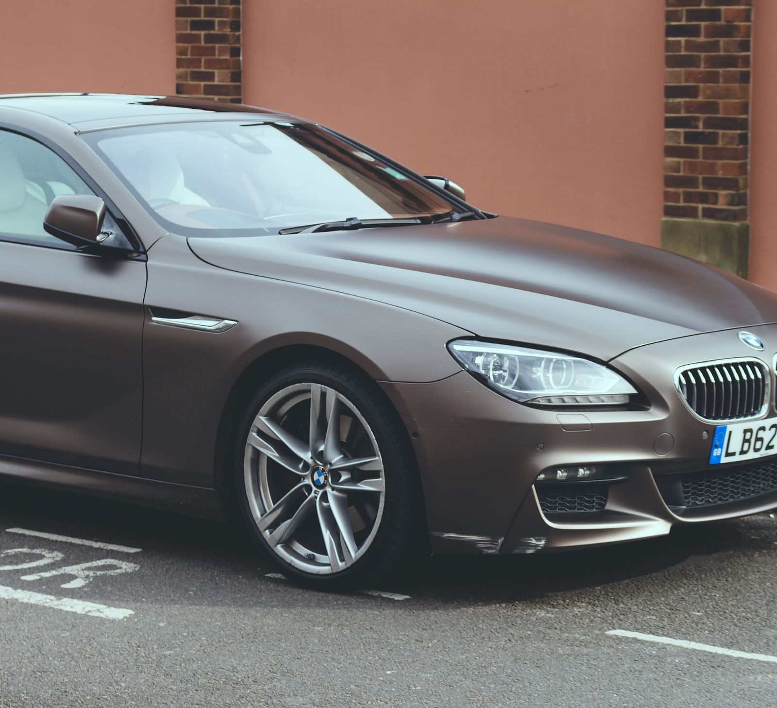A luxury car parked on a city street