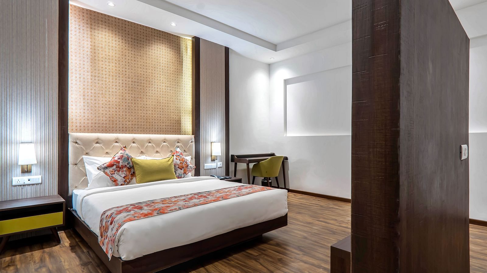 Family Room at Hotel Le ROI Lake View Koti with a sperated TV cabinet and a posh bed for a cosy stay1
