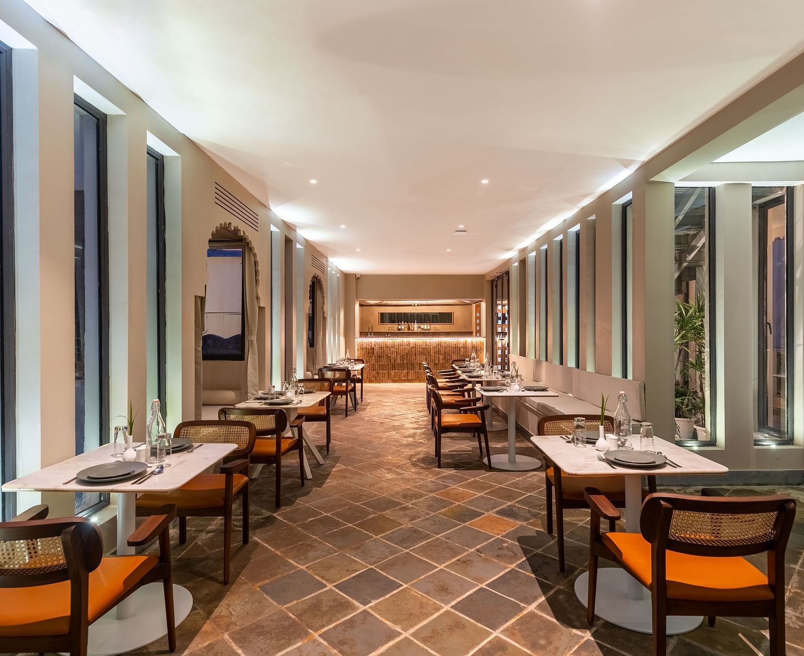 Seating arrangements inside a restaurant at Manuscript - Jhilwara Haveli, Udaipur