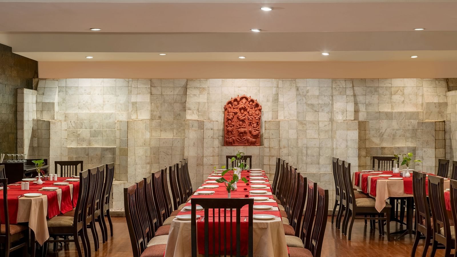 well-laid out tables in our restaurant in Udaipur - Hotel Rajdarshan, Udaipur.