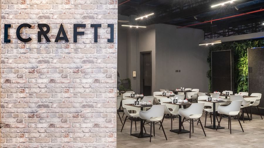 CRAFT restaurant sign and dining tables at Best Western Premier Westlands.