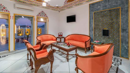 Sofa seating arranged with elegant decor at Maan Vilas by Stone Wood, Udaipur