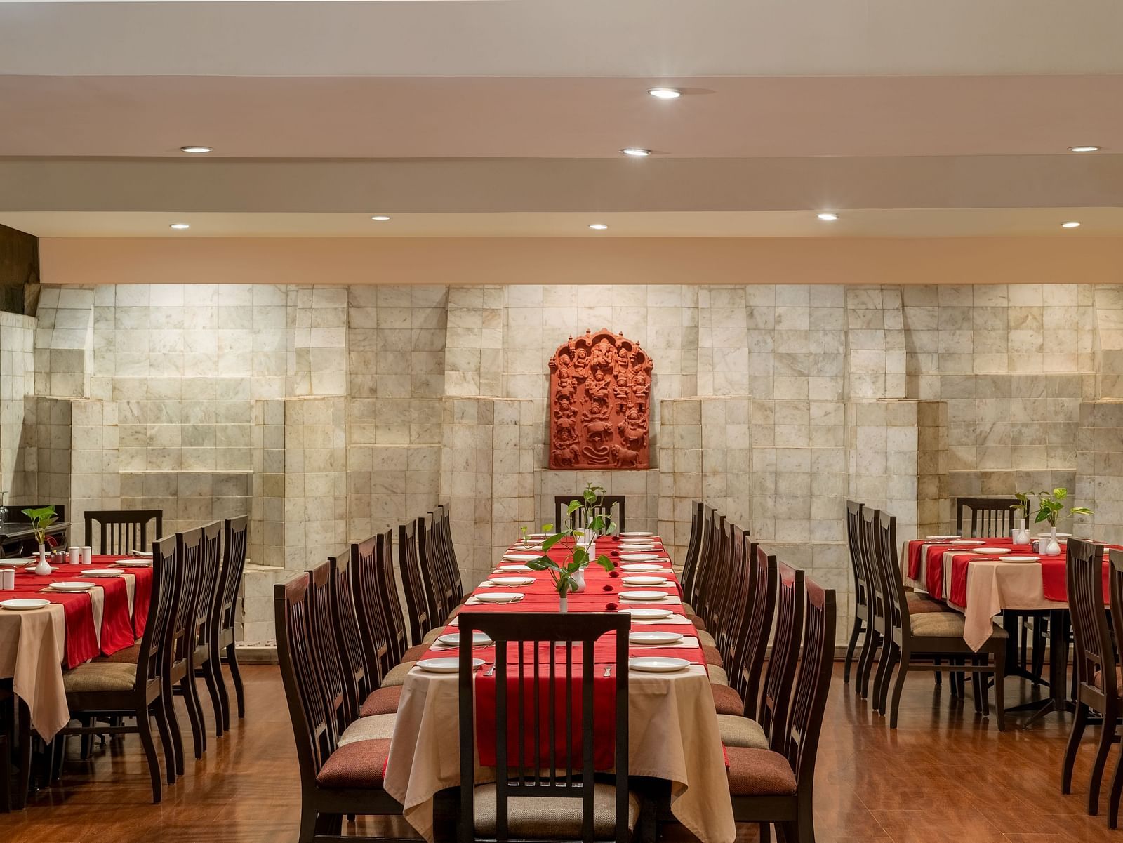 well-laid out tables in our restaurant in Udaipur - Hotel Rajdarshan, Udaipur.