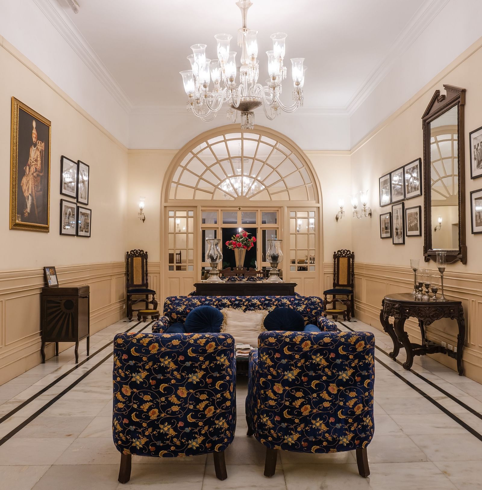 lobby with chairs, a chandelier, wall paintings and other decorative items at The Claridges Nabha Residence, Mussoorie