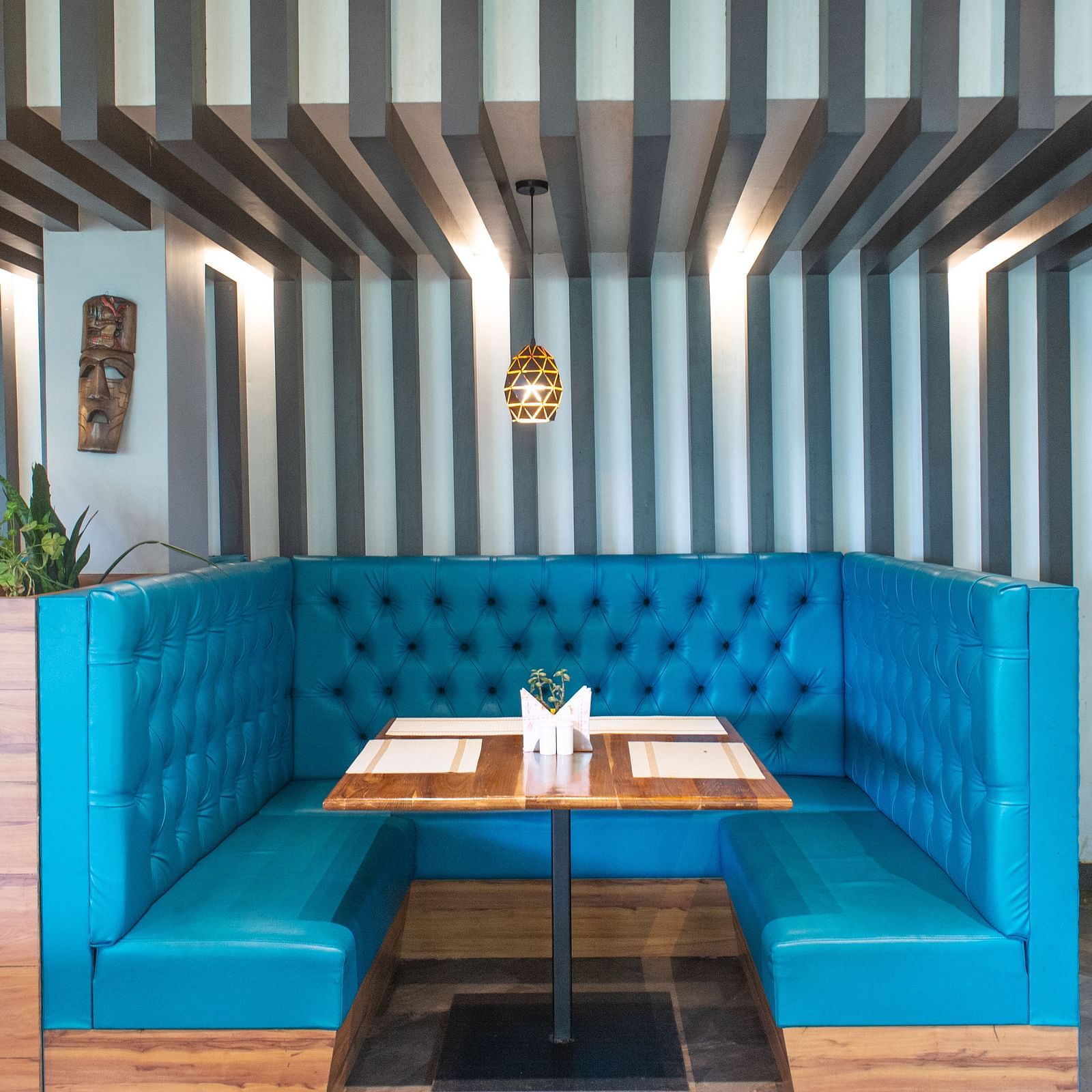 Image of a dining booth at Mad Monkey at Avianna Ganagtok Resort and Spa