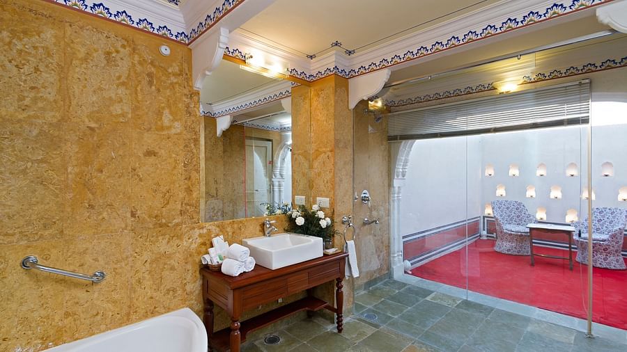 a washroom with a shower and a washbasin  - Hotel Castle Mandawar, Jhunjunu