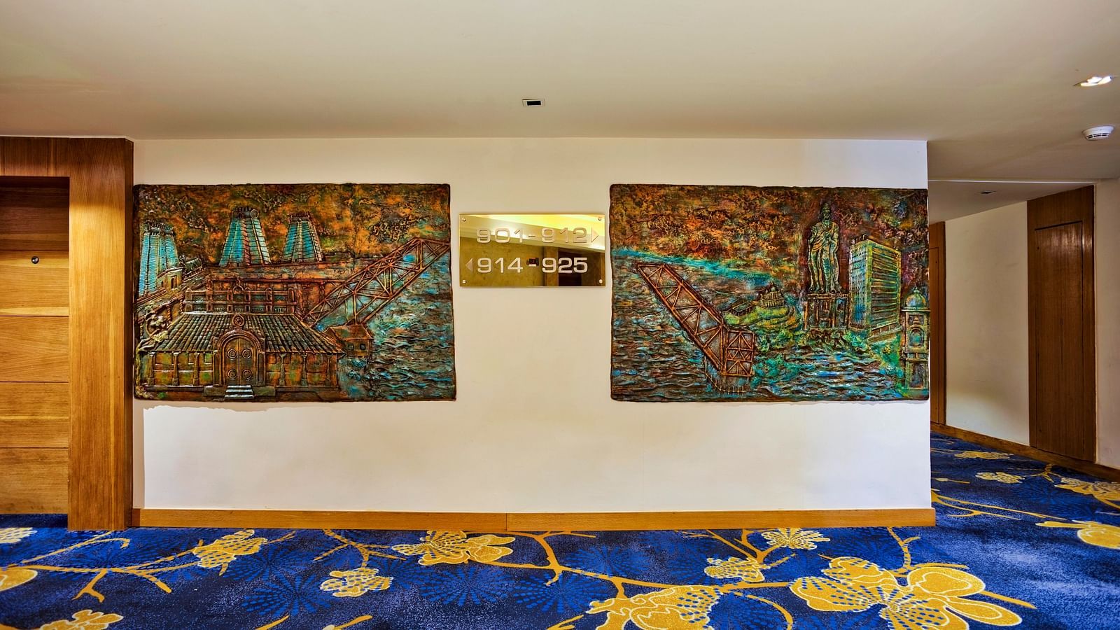 Wall with paintings displayed at Grand Chennai By GRT Hotels.