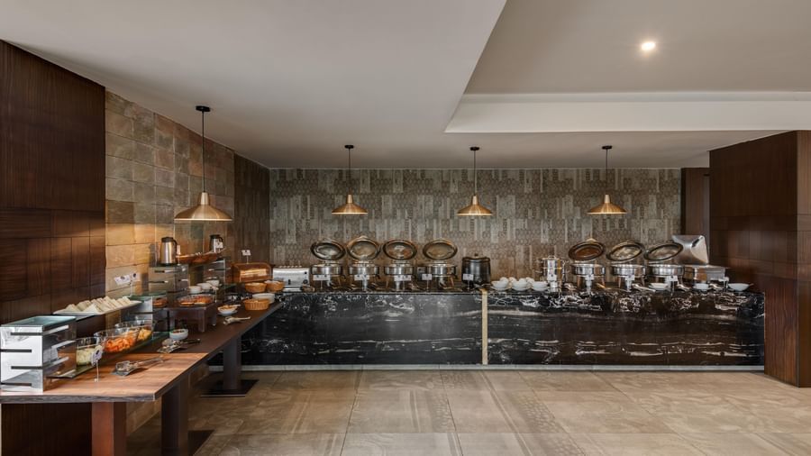 Restaurant buffet spread at Voyage Milestone Hotel and Banquet.