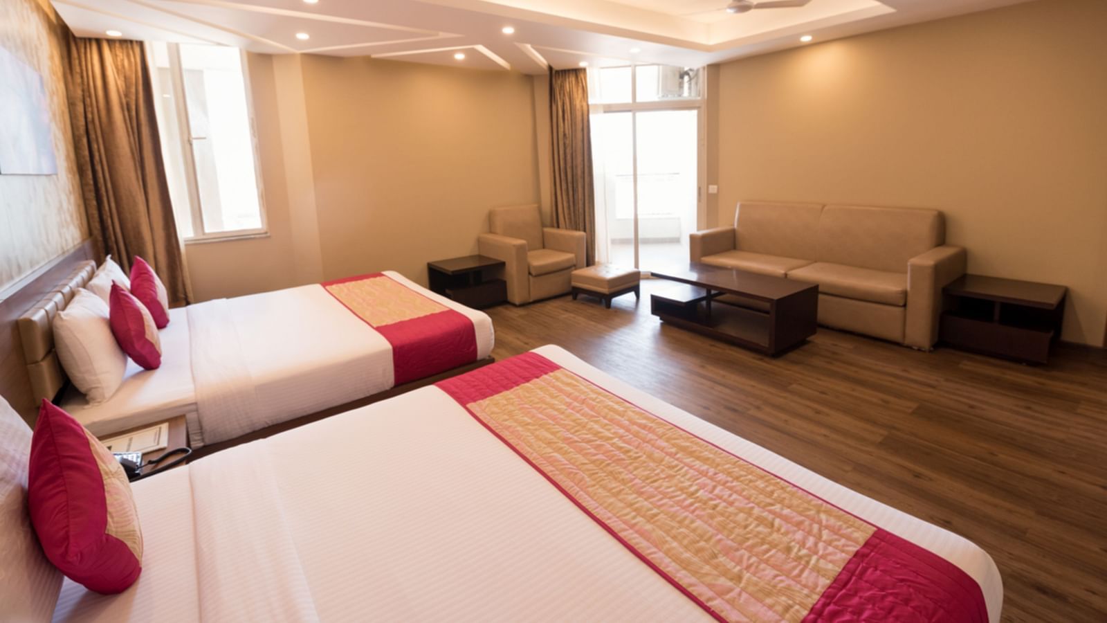 Family Rooms with Complimentary Wi-Fi showcasing queen size twin beds in a room along with various room amenities - Le ROI Digha Hotel West Bengal5