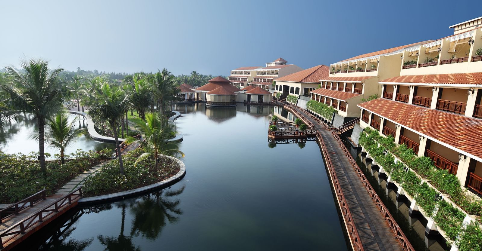 Facade image of Ocean Spray, Pondicherry with a lake and blue sky in view