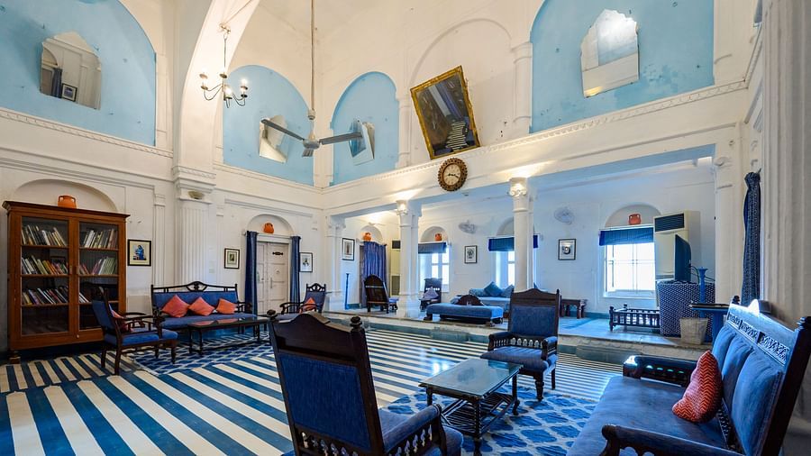 Hill Fort Kesroli 14th Century Alwar - interior view of the Darbar Hall with white and blue decor