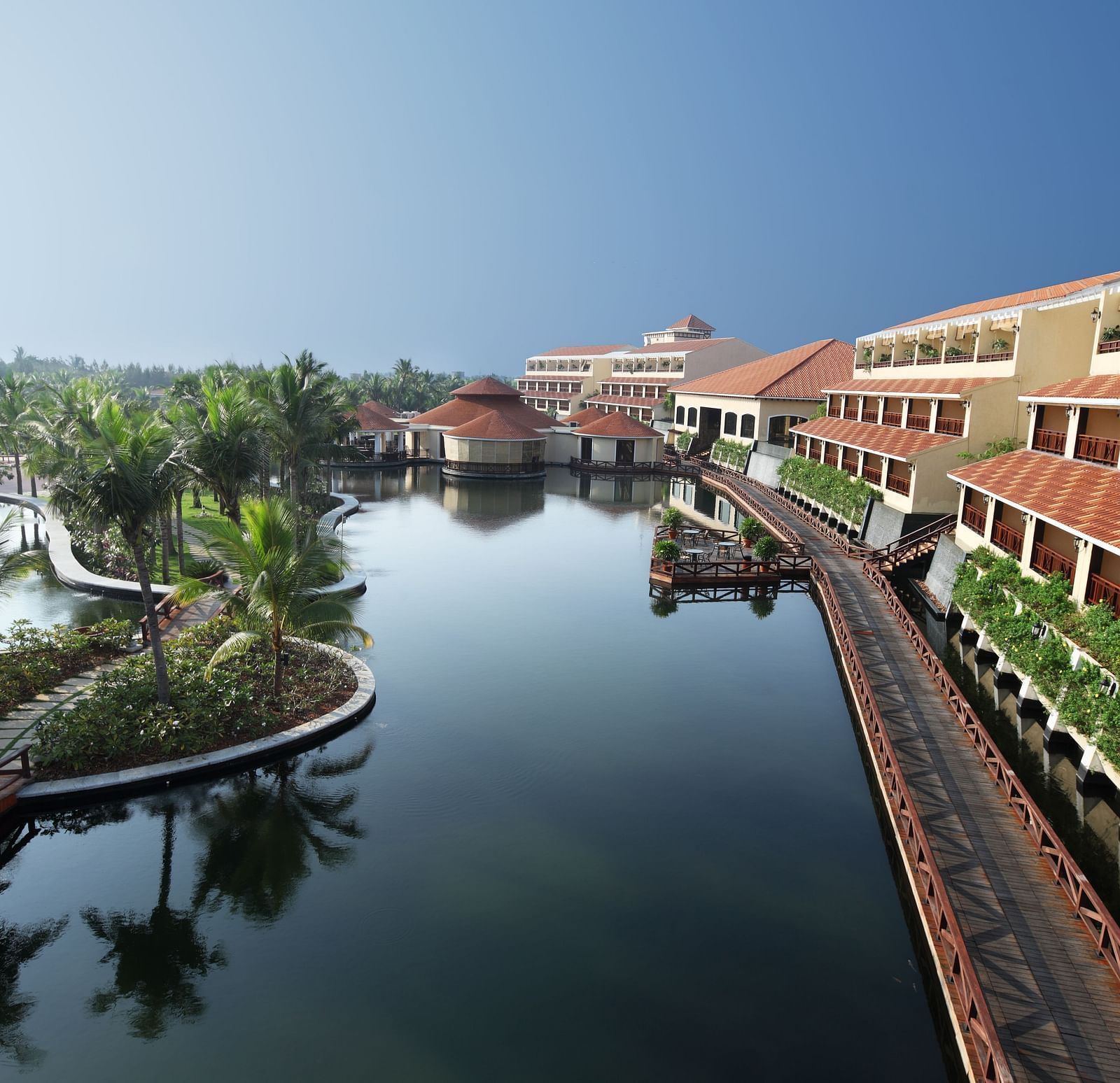 Facade image of Ocean Spray, Pondicherry with a lake and blue sky in view