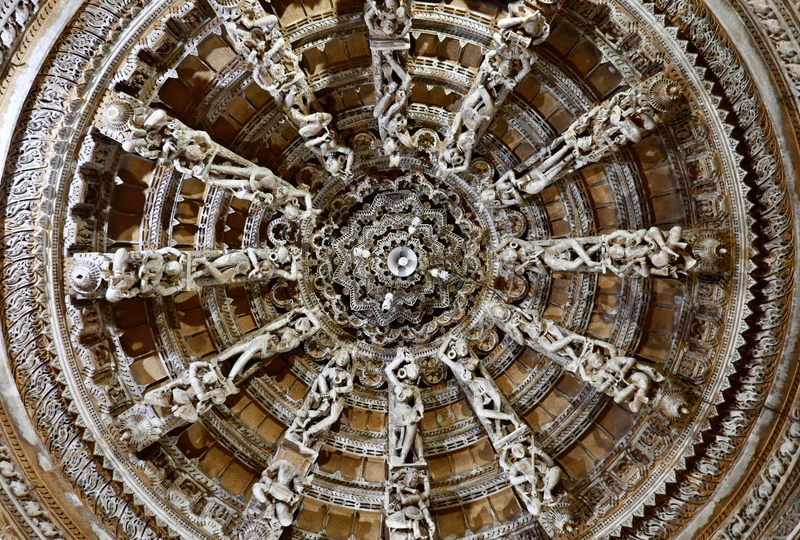 Intricately carved heritage temple dome ceiling