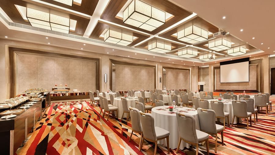 Conference table with round table buffet at the back