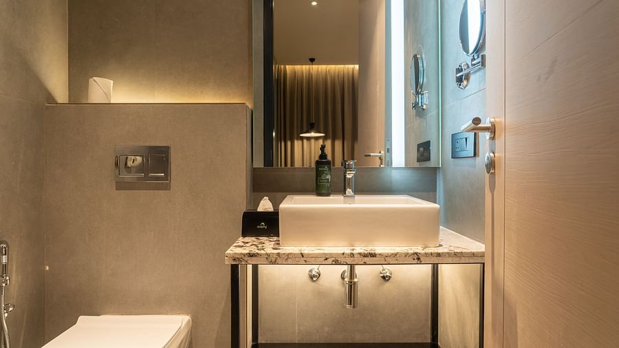Vanity area of a room at Ramada Encore, Bhiwadi.