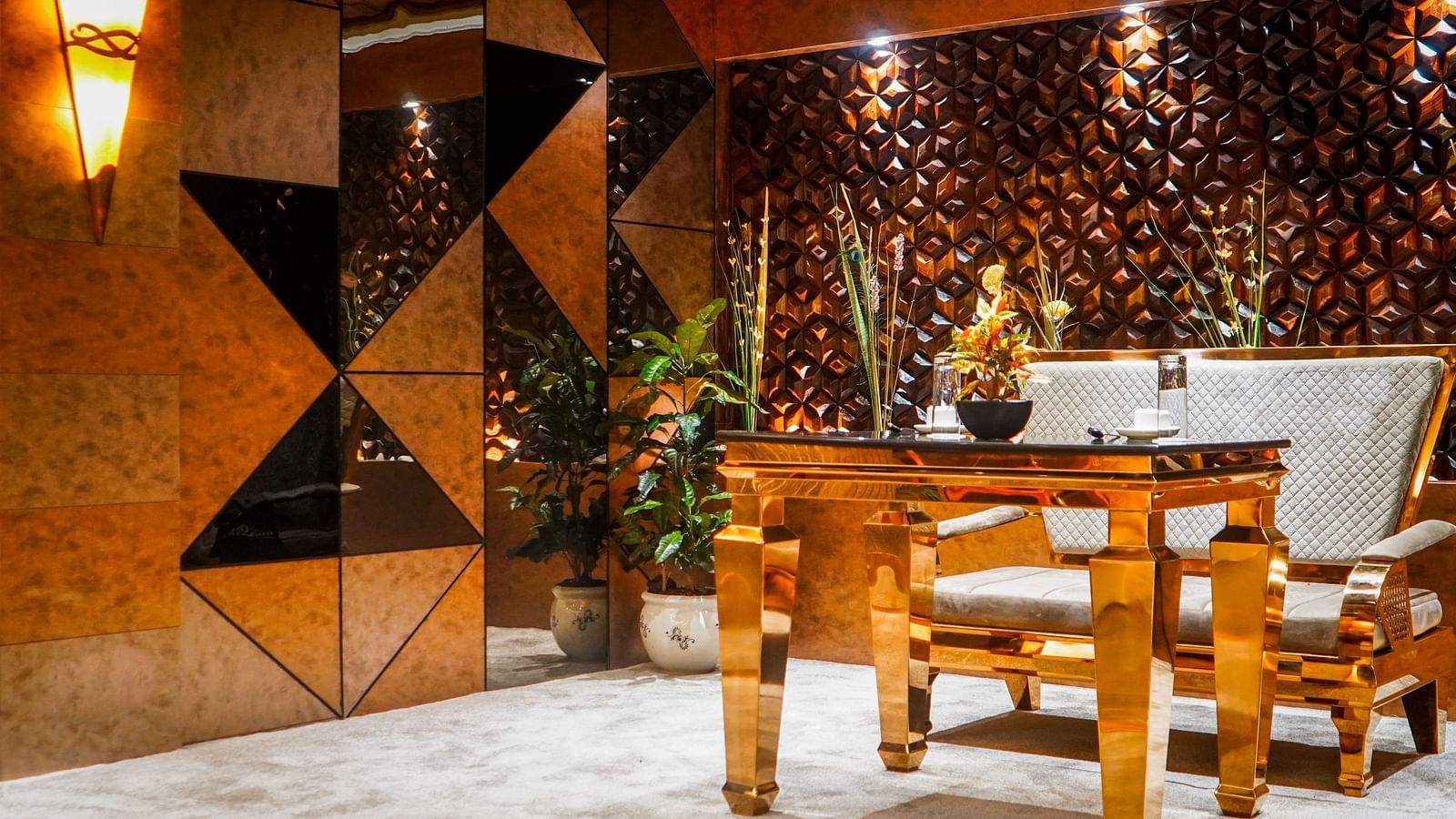 Seatimg area with brown themed decor  at Coral Reef Hotel & Resort