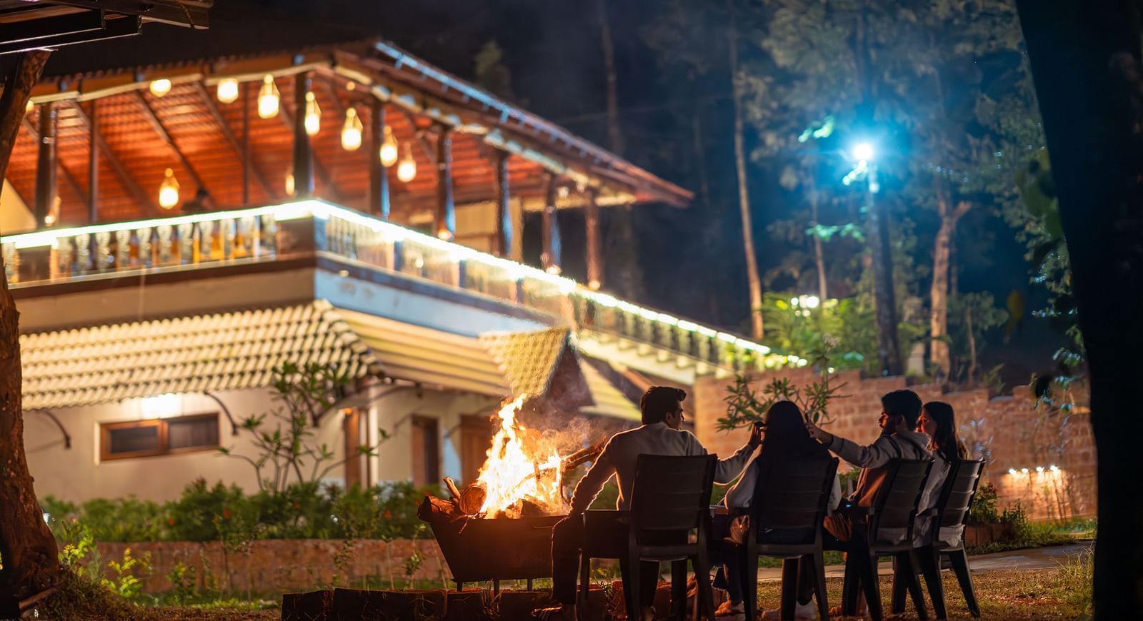 A group of friends enjoying a bonfire