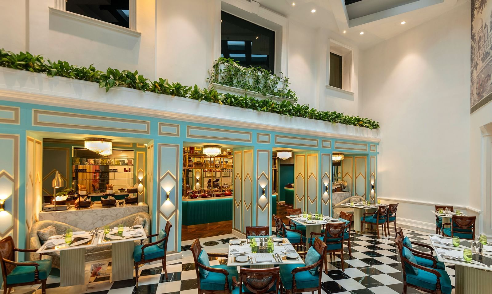 a landscape image of the lutyens deli multi cuisine restaurant with ample space and beautiful ambience - The Claridges New Delhi