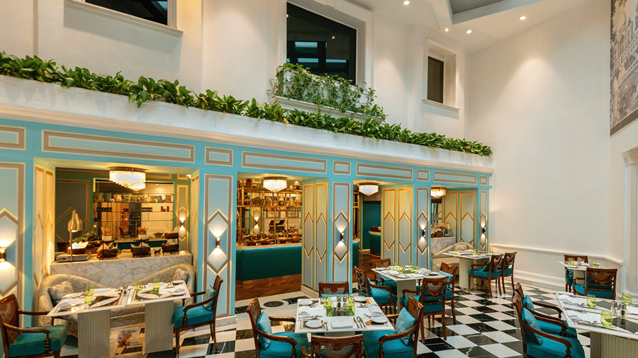 a landscape image of the lutyens deli multi cuisine restaurant with ample space and beautiful ambience - The Claridges New Delhi