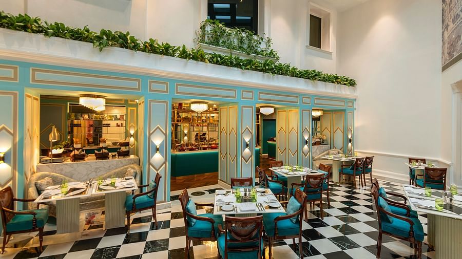a landscape image of the lutyens deli multi cuisine restaurant with ample space and beautiful ambience - The Claridges New Delhi