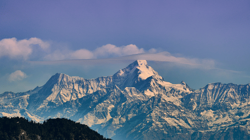 snow-capped mountains seen from snow view point